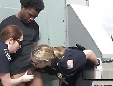 Busty cops take peeping tom to a rooftop when caught spying on white women