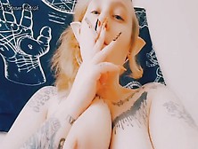 Elf Smokes With Her Boobs Out