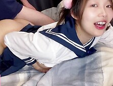 Fresh Japanese with Oriental schoolgirl uniform being pounded from rear-end while watching anime