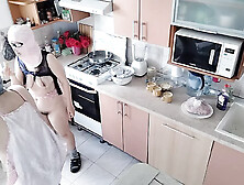 An amateur couple is having fun in the kitchen.