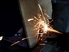 Sparks From Angle Grinder On The Head