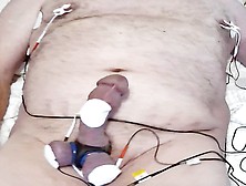Hfo Estim-Elvis Puts 18 Volts To Work On His Cock,  Balls And Nipples.  To Make Sure He Comes...  100 Whacks To His Balls.