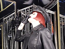 Mistress Tokyo Smoking Cigarette In Leather,  Gloves And Muir Cap