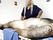 MASSAGE THERAPIST RUBS HIS PATIENT'S WEENIE