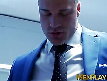 Muscular Executive In A Suit Stuffing His Cute Buff Employee