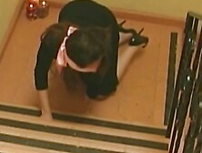 A Stunning Lady in a Latex Dress Satisfies Another Lady with Her Sex Toy