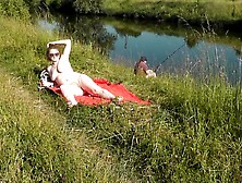 Nudist beach.  Public nudity.  Hot mother I'd like to fuck out of pants and brassiere sunbathes stripped is not shy about fisherma