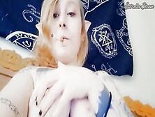 Elf Smokes While Having Fun With Her Titties