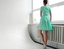 Dressed flexible brunette Alla Sinichka