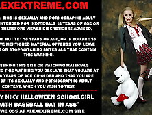 Naughty Niky Halloween schoolgirl with baseball bat in rear-end