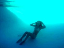 Girl Swimming Underwater