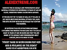 Proxy Paige In Micro Bikini Fist Her Behind & Prolapse On The Beach