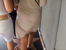 Her White Dress Shows Her Black Thong
