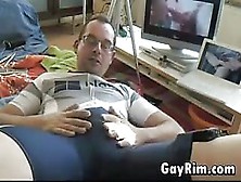 Guy In A Tight Outfit Plays With His Cock