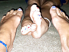 Get down on your knees and cover our bare feet with your cum