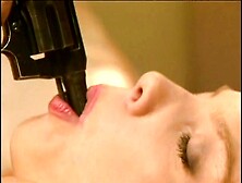 Hottie masturbates with gun