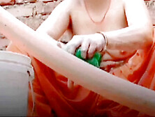 Indian aunty gets dirty while cleaning and enjoying her pleasure
