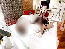 An Adulterous Wife Dressed As Santa Presents An Adult Toy To An