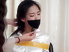 Asian Girl Taped And Stuffed