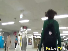 Peeing Asians Over Public Squat Toilet