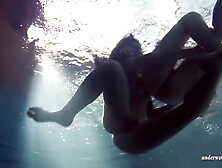 Fun naked girls get naughty in the pool