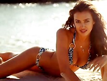 Gorgeous Russian Model In Bikini Poses While Having Collared Cheetah Beside Her.