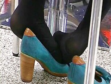 Voyeur Watches Amateur Lady In Public Resting Her Feet And Legs In Black Socks