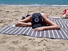 youthful woman gets drilled on the beach by a stranger screwing from behind