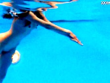 Thin Russian Marfa swims nude in the pool