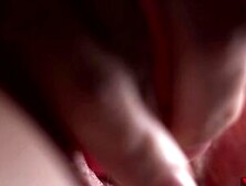 Cougar's wet pussy is filmed from up close while she masturbates