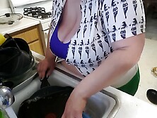 big beautiful woman Cleaning the Kitchen