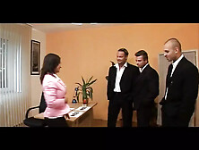 Busty MILF Secretary Sucks Three Huge Cocks in a Bukkake