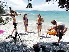 Miss P and Rebeka R on a blue coloured sofa in lesbian dildo scenes together