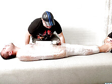 Matt And Ryder Stimulate Tickles On Mummified Pup Saki