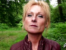 Aged blond woman,  Mendy is having casual sex in the nature,  with a group of lewd boyz