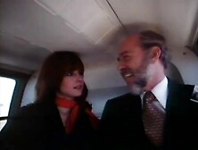 Old bearded fella in a costume getting head in a helicopter