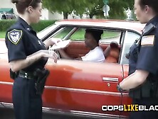 Randy cops arrest a black dude with a huge dick to swallow