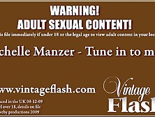 Michelle Manzer in black corset and stockings