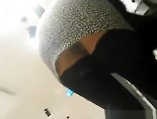 Woman in black stockings and short skirt upskirt (fake)