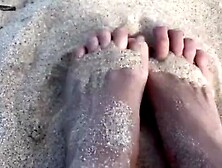 Playing with my hawaiian feet in the sand