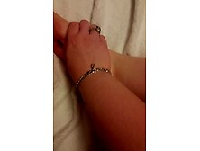 Putting lotion on my tiny,  pale feet after showing them off in my favourite socks