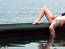 Curvy cougar Cat Asstrophe Masturbates By The Ocean