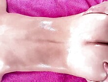 Skinny chick seduced by a horny lesbian masseuse and rubbed into orgasm