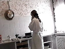 A glamorous blond waits for her spouse to come home from