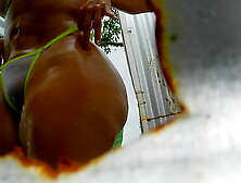 Tanned,  Gigantic-Assed Lady Captured In A Phone Booth