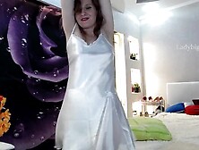 Stunning red-head dance tease in Satin white dress with transparent panties