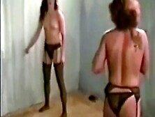 Busty Strippers Engage In A Wild Topless Catfight Wearing Sexy Stockings