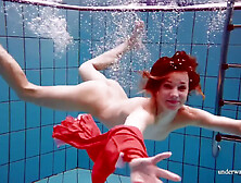 Red Long Dress And Big Tits Floating In The Pool