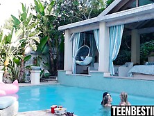 Lesbian pool party threesome with petite teens
