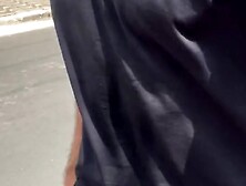 Alpha male with huge dick walking down the street in pants without underwear with the volume showing